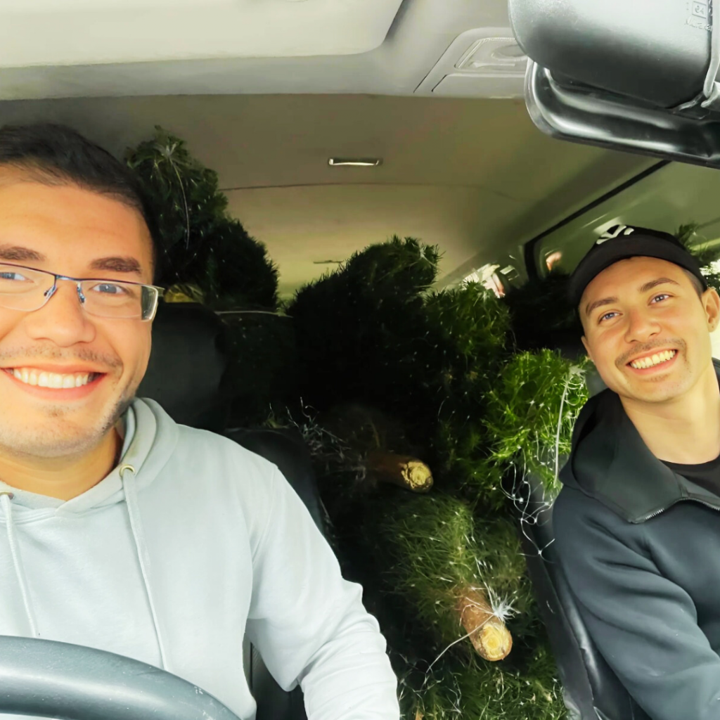 Happy delivery men from Aussie Real Christmas Tree Melbourne on their delivery day